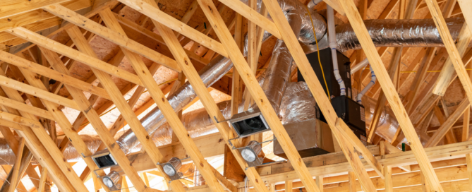 Exposed ceiling ductwork during home construction