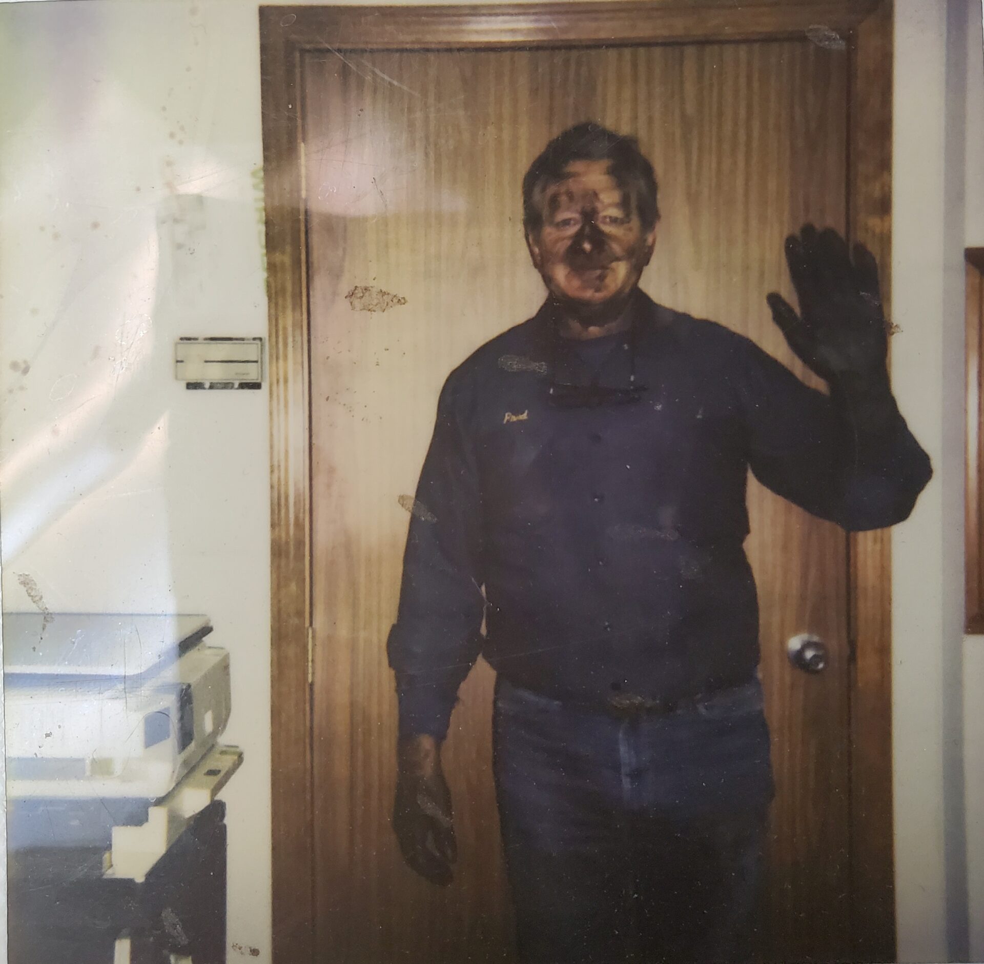 Fred Roper covered in oil during his oil burning furnace days