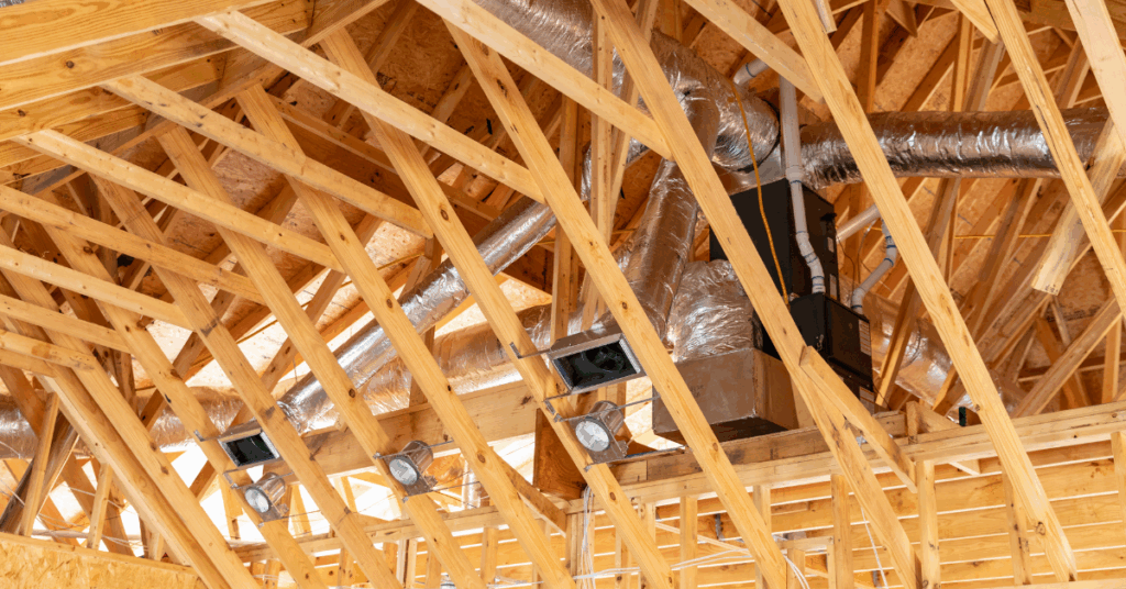Exposed ceiling ductwork during home construction